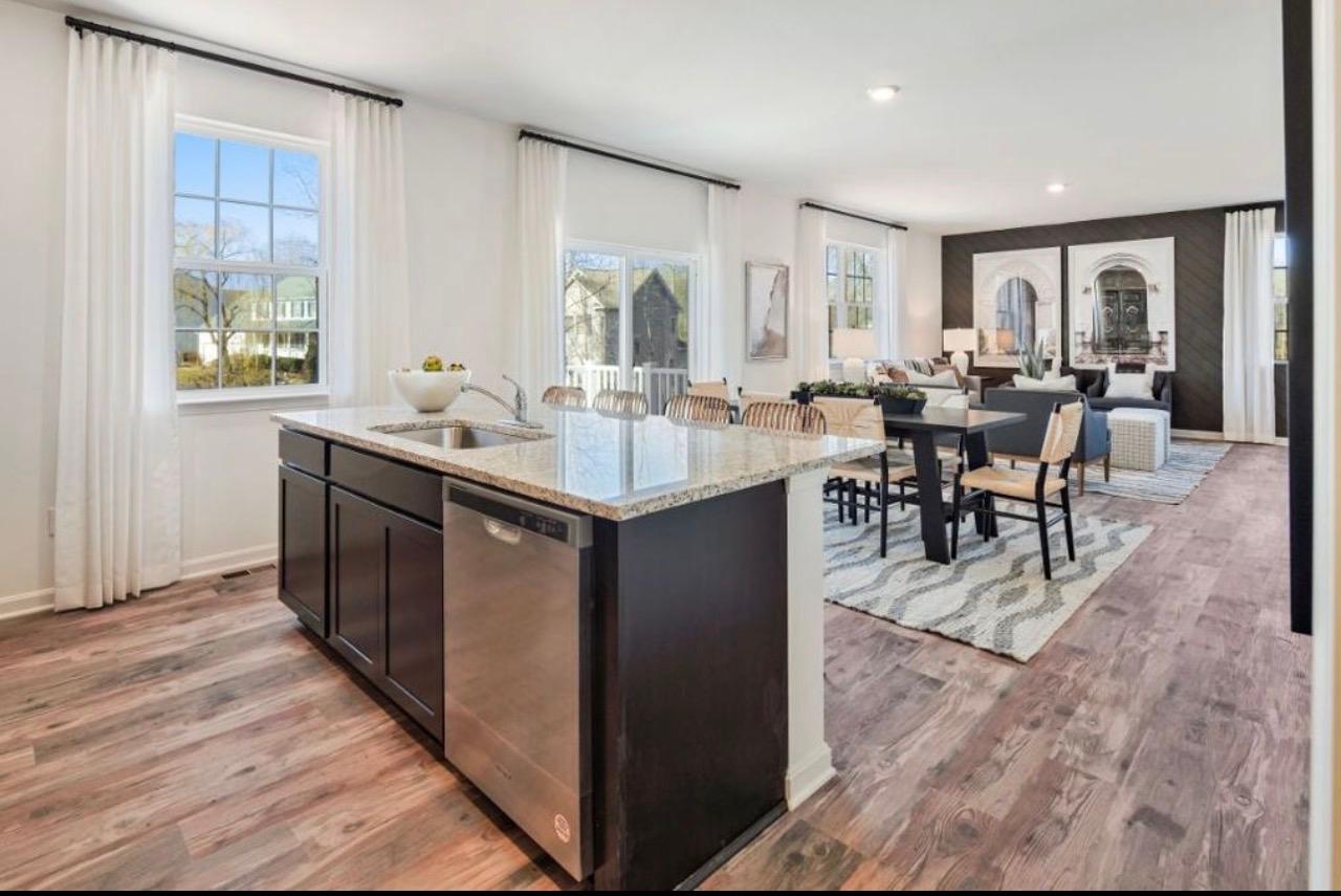 The Frederick Retreat open-concept kitchen, dining area, and living room